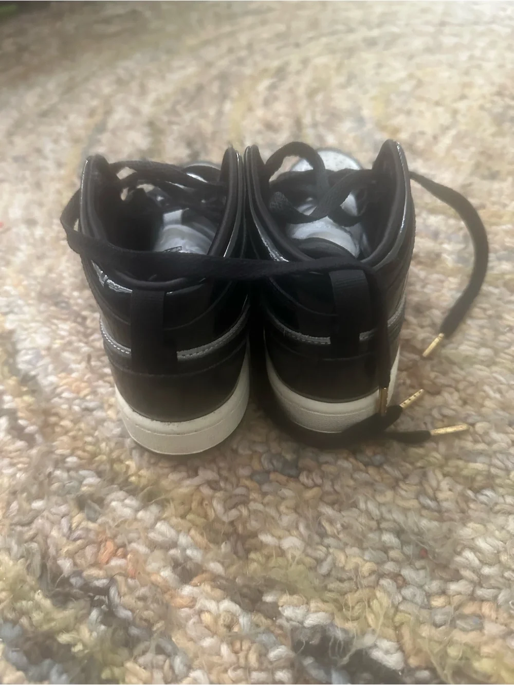 Jordan 1 Mid SE Kids Black and Silver High-Top Sneakers